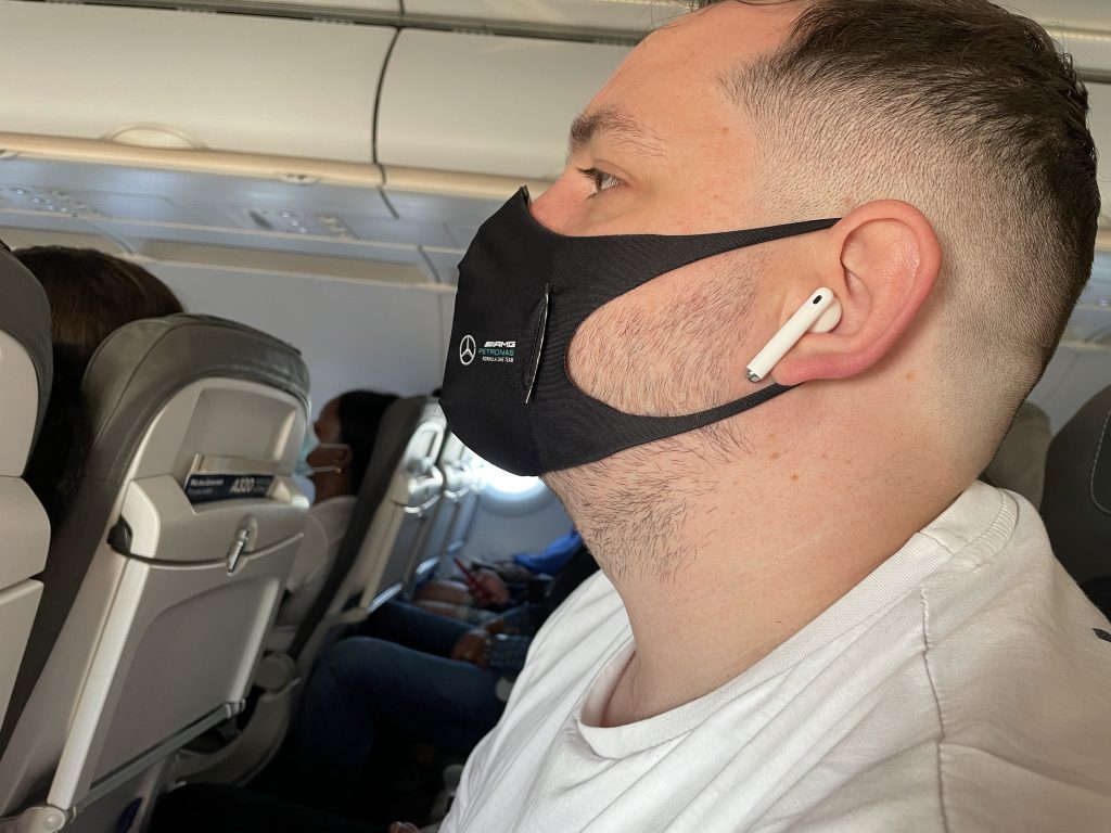 using earbuds on flight with mask